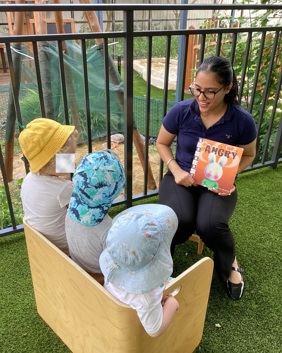 Story time hits different outside. 📖☀️

Little ears, big imaginations — our educators at Wahroonga preschool bring stories to life every single day. 

These quiet moments of connection are where the real magic happens.

Because at our Wahroonga long day care, every child deserves to feel seen. 🧡

#childcare #littlelion #kidslearning #playbasedpreschool #daycarelife